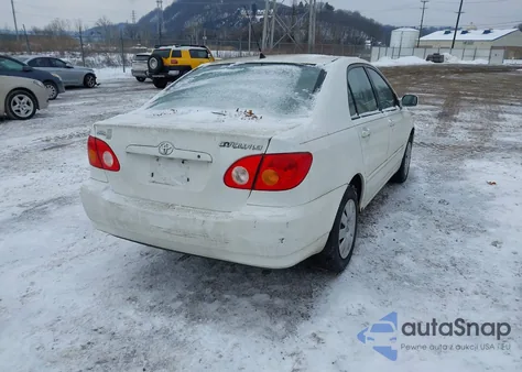 2003 Toyota Corolla Le z USA, uszkodzony, nr VIN JTDBR32E732015404